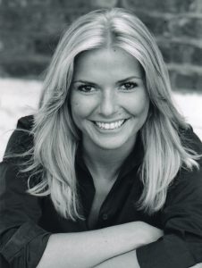 A black and white headshot of Lucinda Kennard, a dancer.